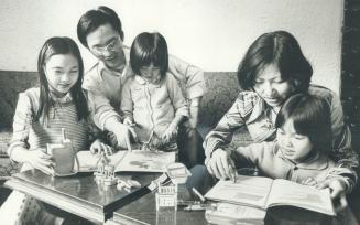 Anh Due Nguyen, his wife, Kim Lien, and daughters Lien Dai, 12 (left), Lien Trang, 7, Lien Anh, 10, came to Canada a month ago
