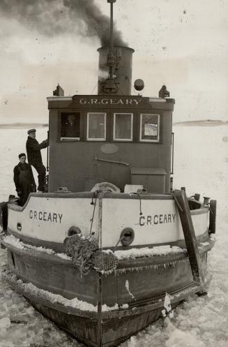 One of the two city tugs that buck the floating ice