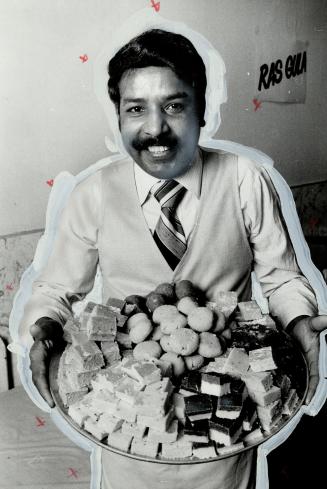 Munch merchants: Wilson Massey (above)offers some of the delicacies at Prince's Sweets, a haven for dessert addicts on Gerrard