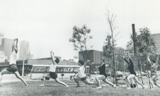 Fitness classes, above, are held at Harborfront Park during lunch hour