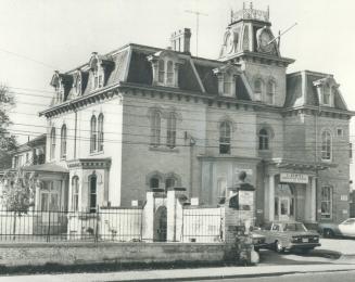 Once the lavish home of a prominent Toronto sporting figure, George Wathen Beardmore, this yellow brick house at 136 Beverly St. is now occupied by Costi, an immigrant aid organization