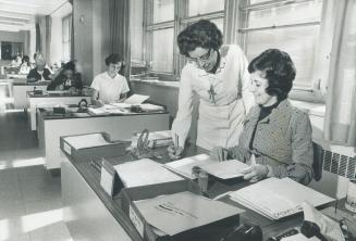 Sister Pauline O'Leary, left, is director of medical records department of St