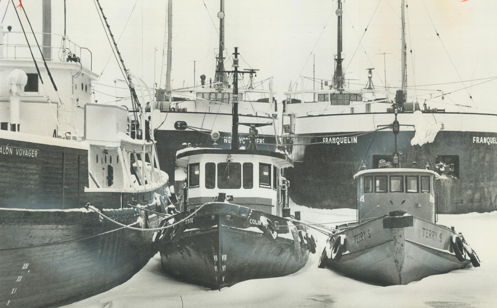 Image shows a number of boats wintering at the Harbour.