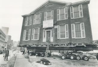 Historic photo from Wednesday, March 29, 1972 - 150-year-old house built by Sir Wiliam Campbell, chief justice of Ontario from 1825 to 1829, on trailer in Old Town