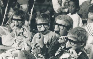 Making their marz in showbiz. Patients at the Hospital for Sick Children ham it up with Groucho Marx props yesterday at the taping of a segment of the(...)