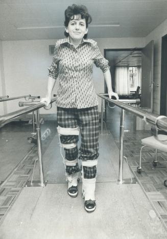 Car crash victim Cora Davies learns to walk again using arm rails at the new Lyndhurst Hospital, which was officially yesterday. The hospital, which r(...)