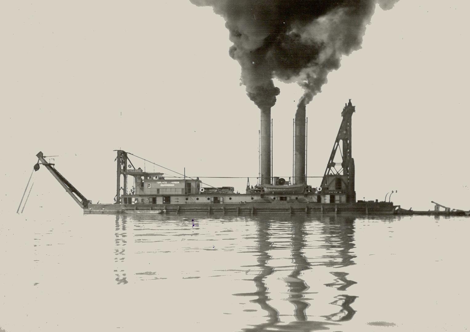 Image shows a pump dredge boat on the lake.