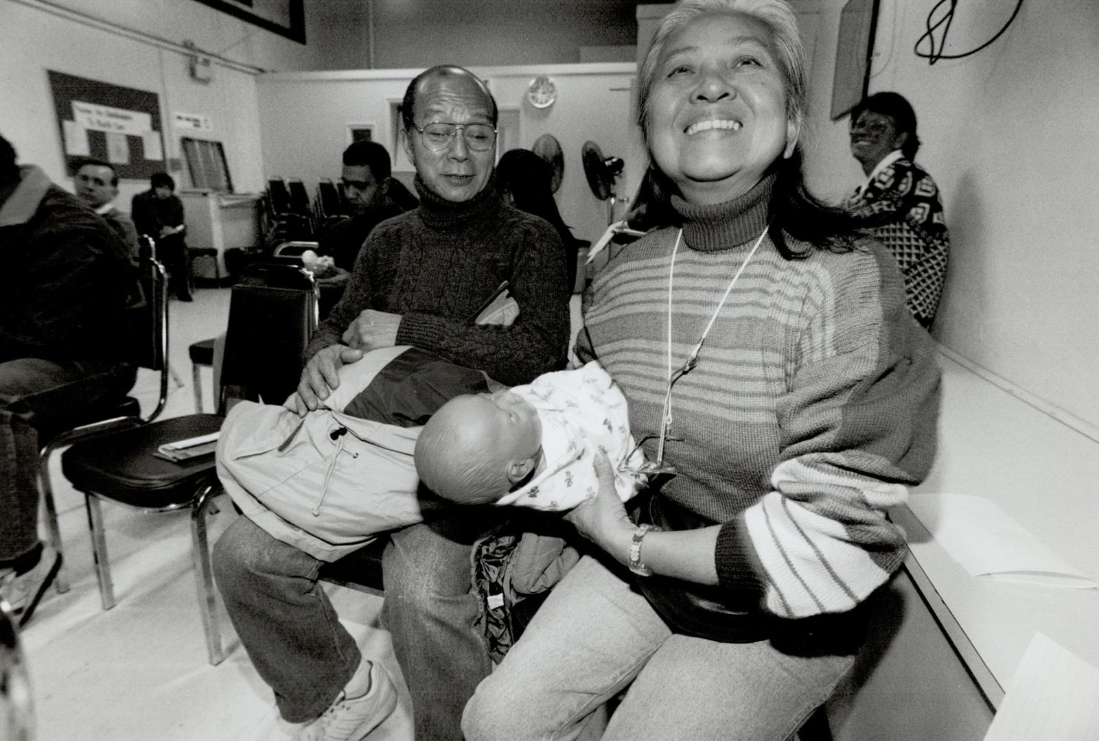 Le Chuoiling and Le Chunpong attend a demonstration on care of newborns