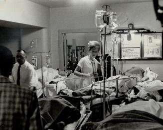 Crowded Corridors were the rule at Toronto East General hosptial last night as doctors and nurses with a sudden influx of food poisioing victims. More(...)
