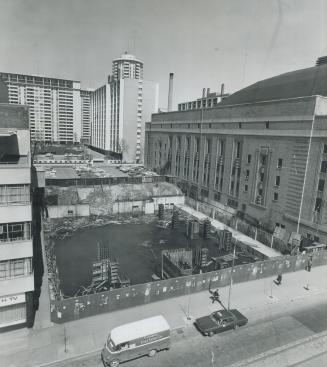 Moon crater near Maple Leaf Gardens - surrounded by a blue fence and empty since it was dug in the late '50s - was to have housed the Lord Carlton Hot(...)