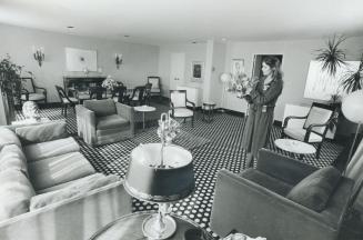 Cher (right) slept here: The Prime Minister's Suite in Sutton Place, $450 a night for five bathrooms, three bedrooms, mahogany floors and paintings by Harold Town, Jack Bush and Kenojuac