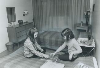 More room to spread out is what Darla LeMesurier, 11, and sister Dawn, 8, found when their mother moved from a $130 two-bedroom apartment into an $85 (...)