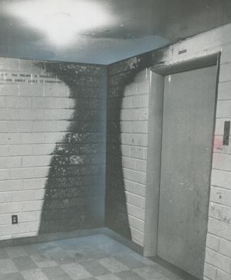 Burned wall outside an elevator in an apartment in Regent Park South was photographed by a Star team on one of its visits there to gather material for(...)