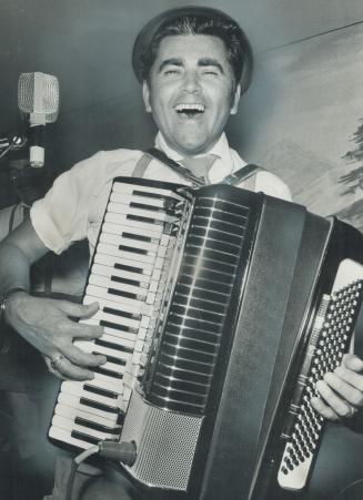 Beaming Joe Gasko. Accordionist at Budapest pavilion