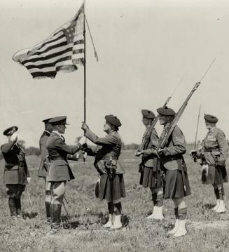 Col. Remington presenting the color to Col. W. W. Soden-Irwin of the Irish regiment
