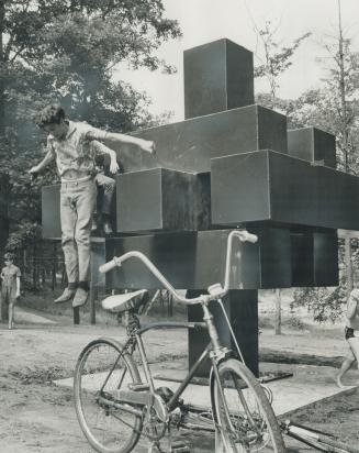 High up in high park. Artistic heights of the first completed work in Toronto International Sculpture Symposium provide a 15-foot jump for Norman Jurc(...)