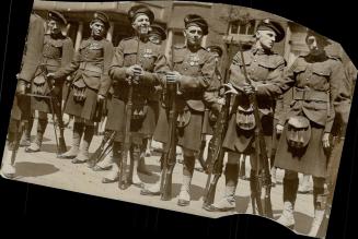 Irish don't wear kilts, eh? Well here' a glimpse of the Guard of Honor of the Toronto Irish Regiment