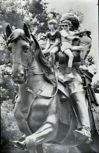 King Edward VII, who as Prince of Wales opened Queen's Park in 1860, shares his horse with John Maloney and Andrew Kates, both 12. The bronze statue was brought from India and unveiled here in 1969