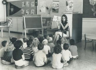 The first day on the job left kindergarten teacher Trisha Langley weary but happy