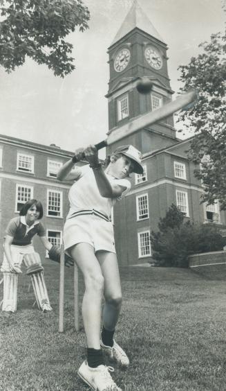 In Blue Jays cap, David Robinson, 11, bats with Adam Rosenfield, 12 as the wicket keeper in Grade 6 cricket house league at Upper Canada College Principal Dick Sadleir says baseball is more popular