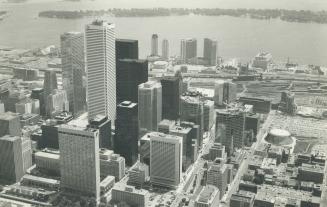 Image shows an aerial view of the Harbour buildings with the lake in the background.