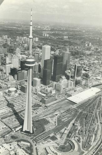 Image shows an aerial view of the CN Tower and the Harbour.