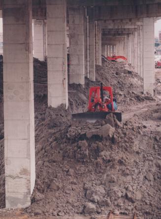 Truckloads of dirty snow and paled under gardiner expressway [Incomplete]