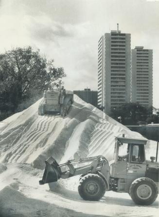 Digging in for a long winter. A huge pile of salt - 4,300 tons of it - is heaped up in the city yard at Yonge St. and pears Ave. in preparation for wi(...)