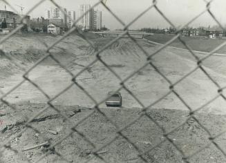 The Spadina is stopped: Unpaved roadbed waits for some kind of use between Lawrence and Eglinton Aves