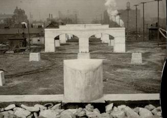 The new Spadina avenue bridge, now ready for the steel work, spans the railway yards from Front street to Fleet street and will be one of Toronto's largest bridges