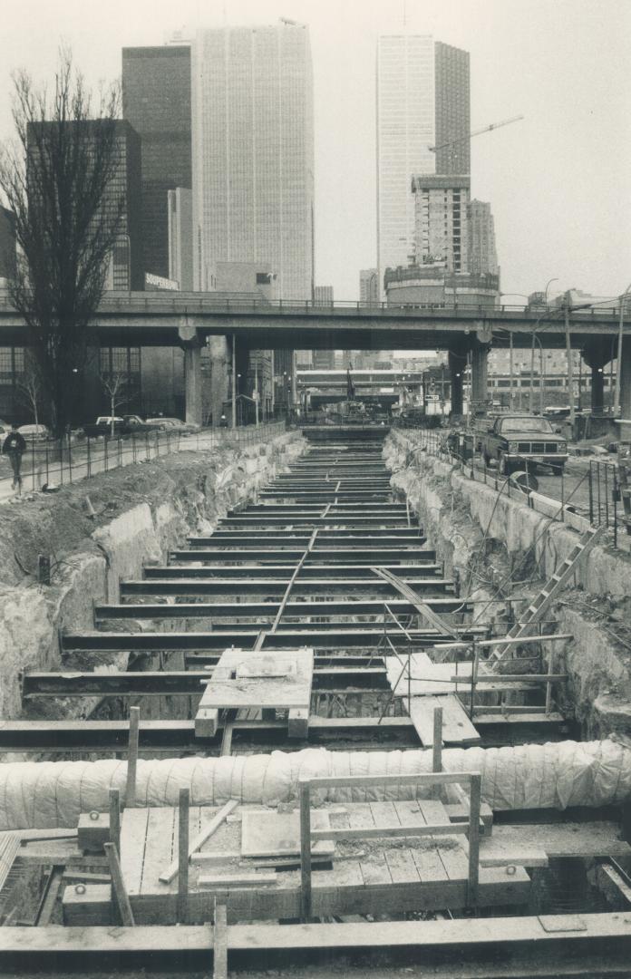 Bay st. takes shape. Bay st., looking north from Queen's Quay