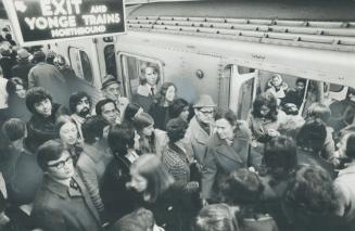 Rush hour crowds jam the platform at the Yonge station of the Bloor subway, a major transfer point for passengers
