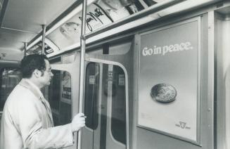 Go In Peace posters, above, are praised by reader for making subway travel warmer and more relaxed