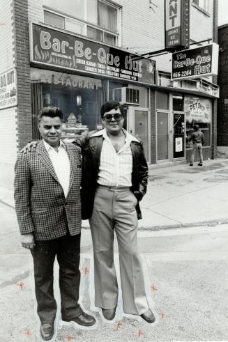 Spicy strip: Gerrard St. east of Greenwood Ave. is Toronto's Little India. Naaz cinema (above) is focal point for 43 shops and restaurants selling Asi(...)