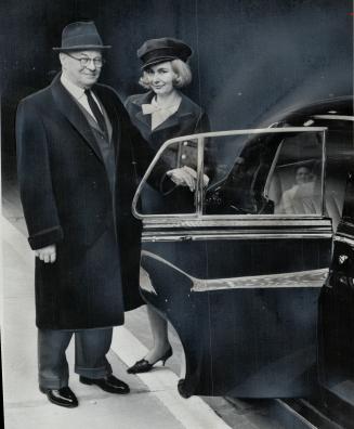 Driver Monica Klement offers Fred Smith ride in Rolls-Royce