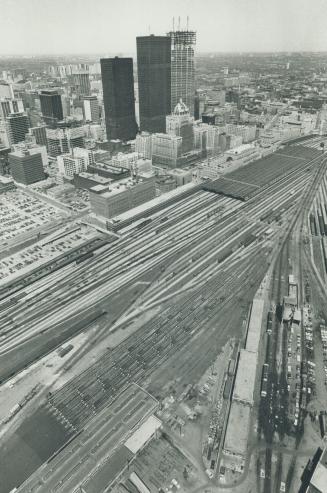 Image shows an aerial view of the Harbour with skyscrapers in the background.