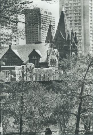 Victoria College with Plaza II Hotel and many life at right 2 bloor W at left