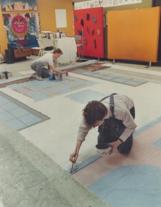 Crowded out: York University drama students Bill Corcoran and Scott Martin paint a large backdrop in a warehouse the university had to rent for classroom space and preparation of props