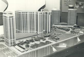 Image shows a model of a few waterfront buildings.