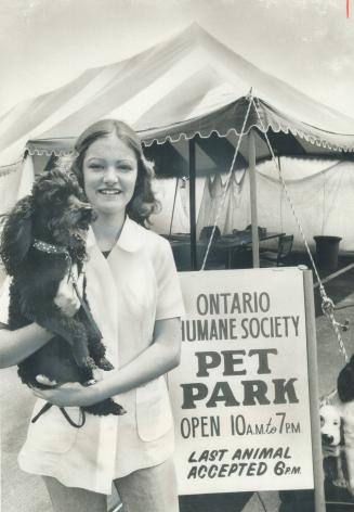 Looking after visiting pets, Lydia Chornewich, 18, works for the Metropolitan Toronto Zoo, in the pet park, run by the Ontario Humane Society, Reader wishes other places provided same service