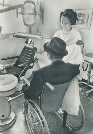 Patient in wheel chair is about to get dental care