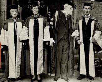 Miss Jean Gunn and Lady Tweedsmuir pause outside Convocation hall with Sir William Mulock and the governor-general
