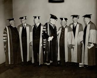 Honorary degrees conferred on diplomats, governor, Air Marshal, Seven distinguished figures in the life of Britain, Canada and the ited States are sho(...)