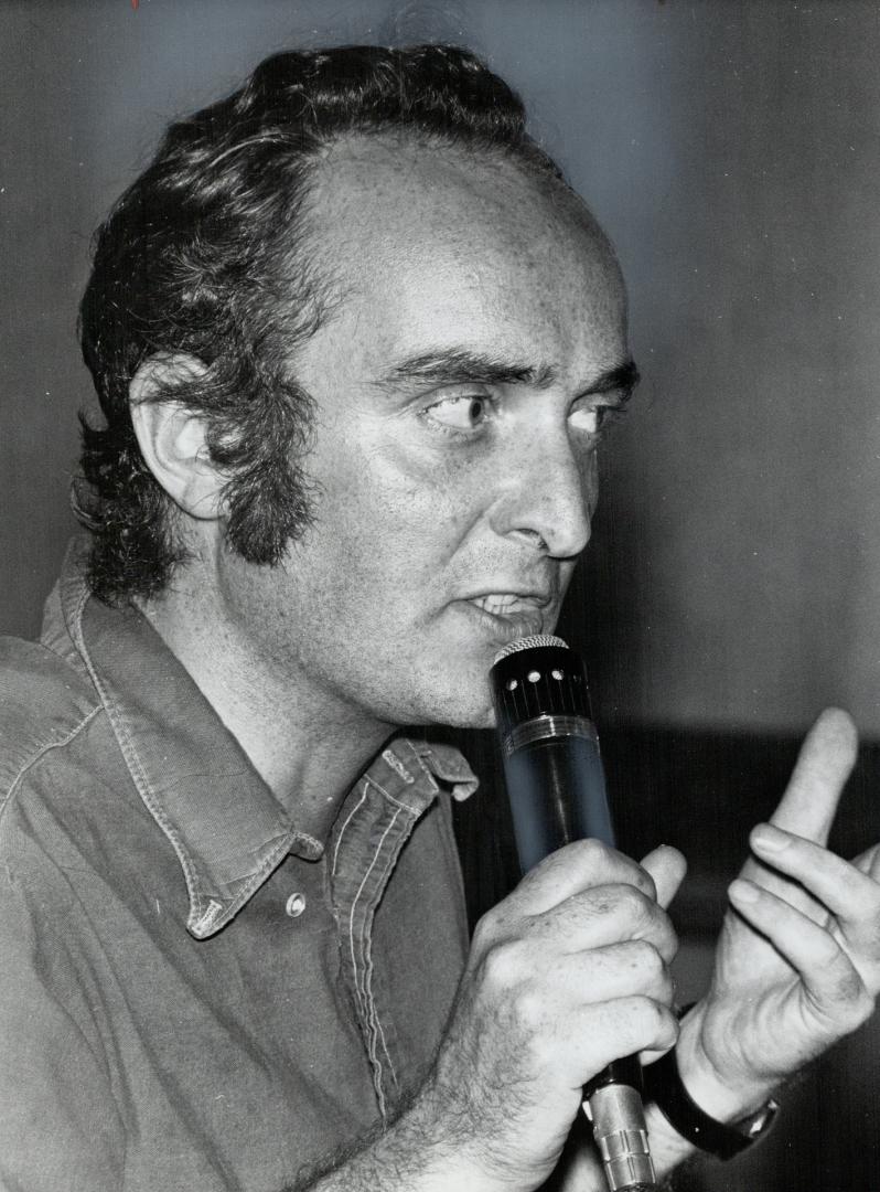 Professor Michael Gregory takes microphone during the Glendon debate