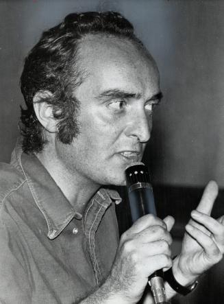 Professor Michael Gregory takes microphone during the Glendon debate