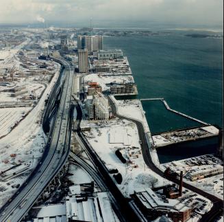 Image shows an aerial view of the Harbour covered with snow.