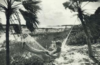 Taking it lying down while 'marooned' on an isolated cay in the Bahamas