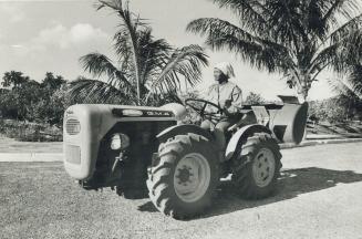 School student Nuns tractor on Isle of Pines