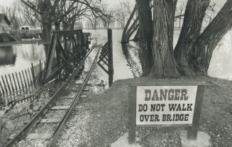 Bridge washed out: Parts of the Centre Island miniature railway were washed out yesterday as rising Lake Ontario waters covered sections of the Toronto Islands