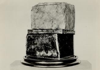 Pewieaw and tin container in which it was found on Beachy Island in 1923